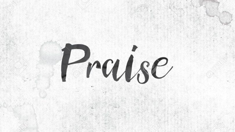 The word Praise concept and theme painted in black ink on a watercolor wash background.